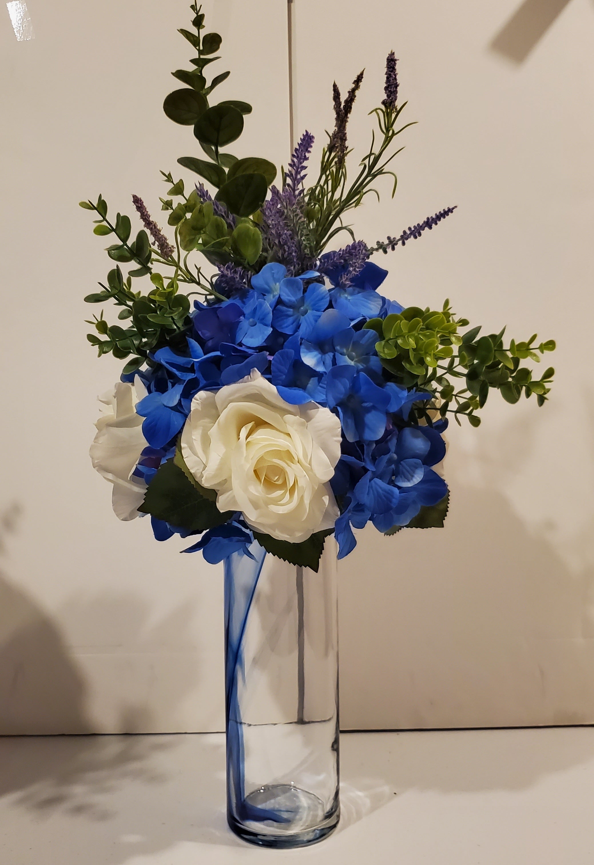 Blue hydrangea bouquet with rose and eucalyptus 