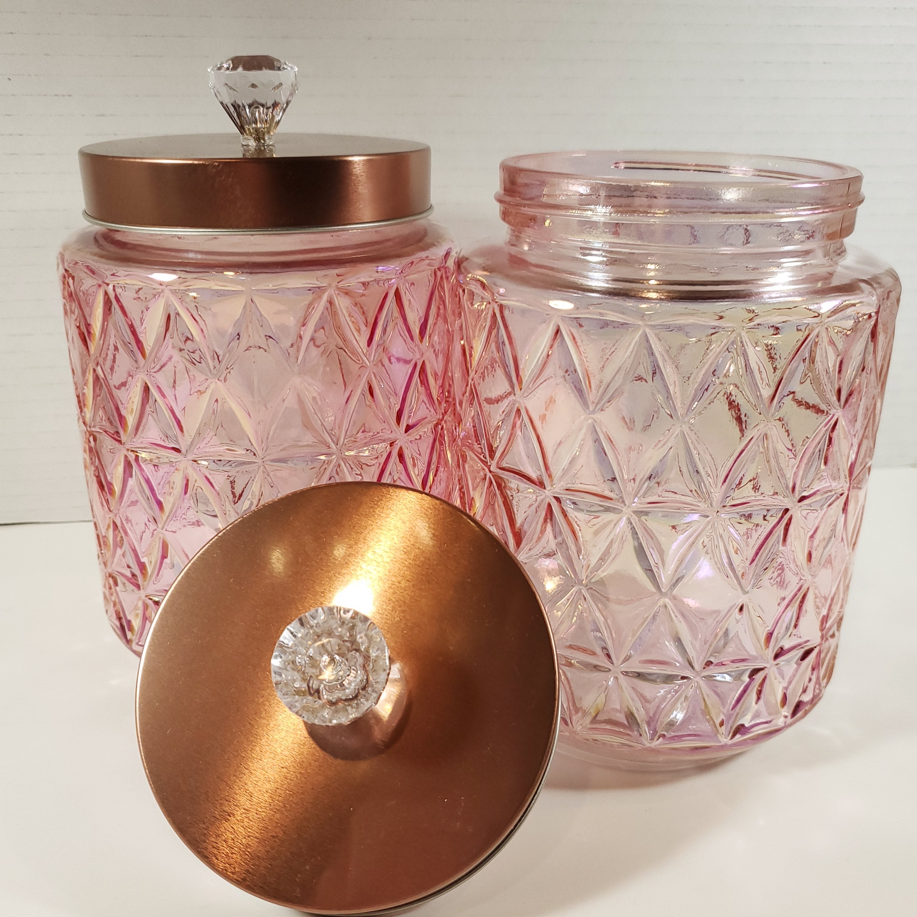 Blush pink textured glass storage jar with gold lid and crystal knob used for candy buffet and event table decor