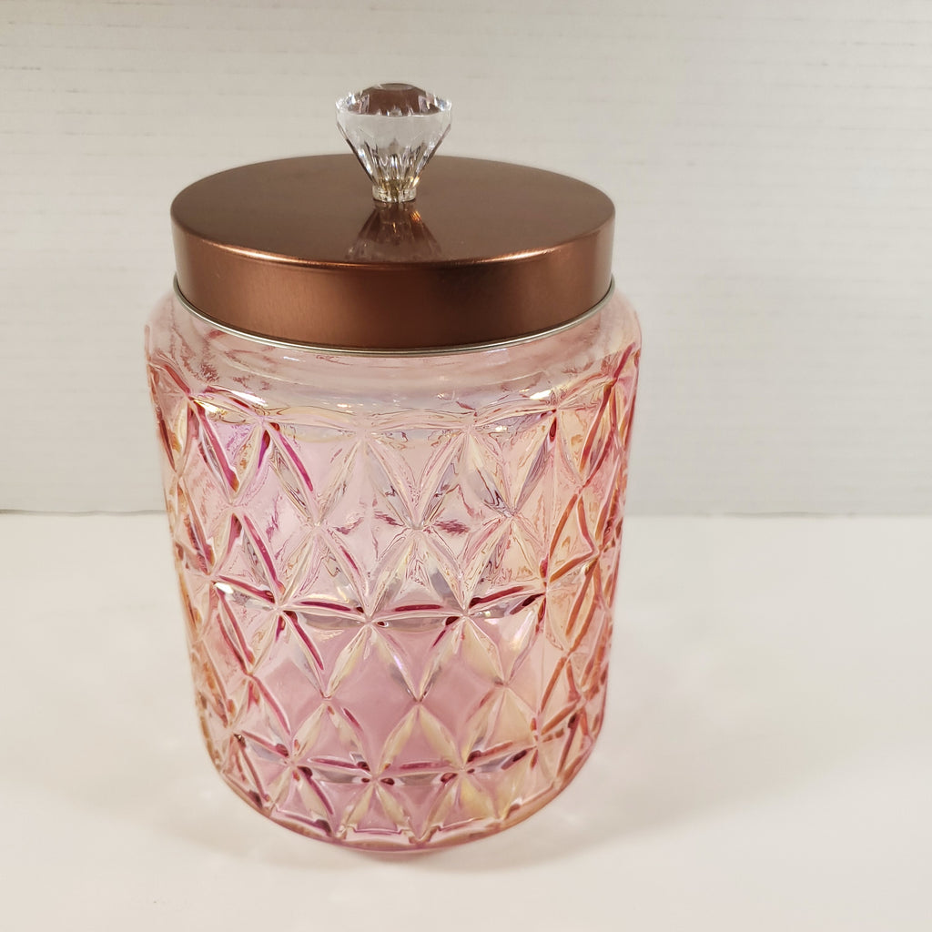 Blush pink textured glass storage jar with gold lid and crystal knob used for candy buffet and event table decor