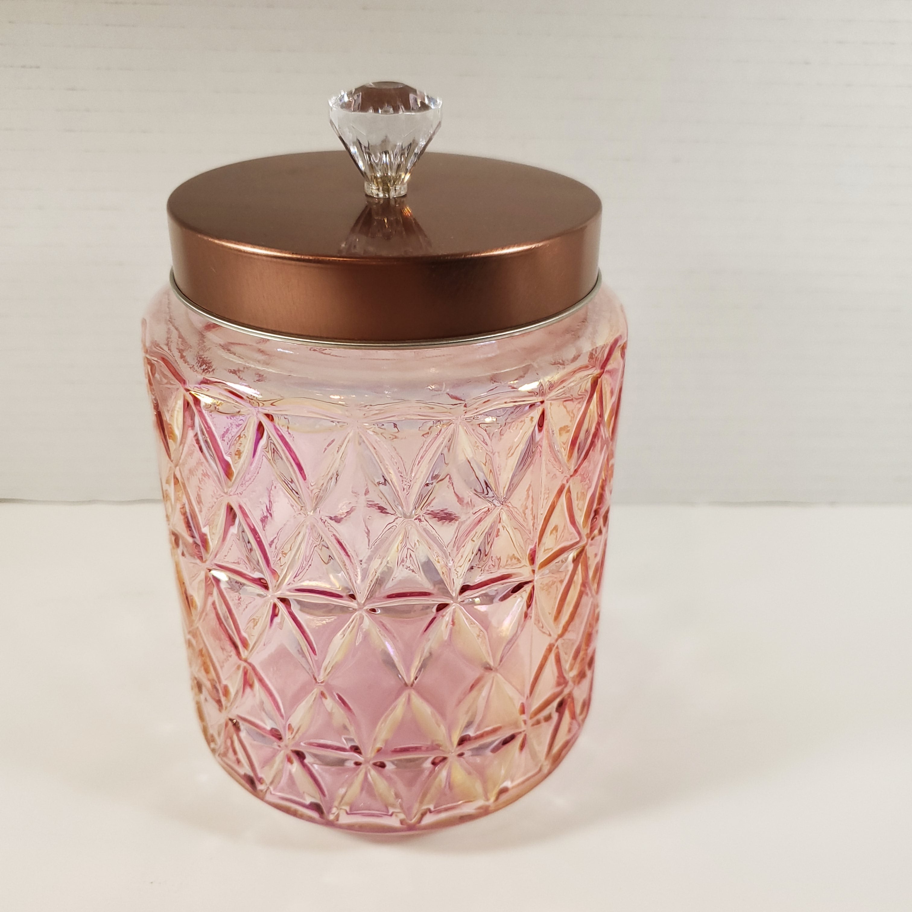 Blush pink textured glass storage jar with gold lid and crystal knob used for candy buffet and event table decor